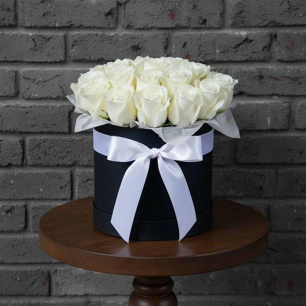 Цветочная композиция из Розы в шляпной коробке в Северном Оренбургской области